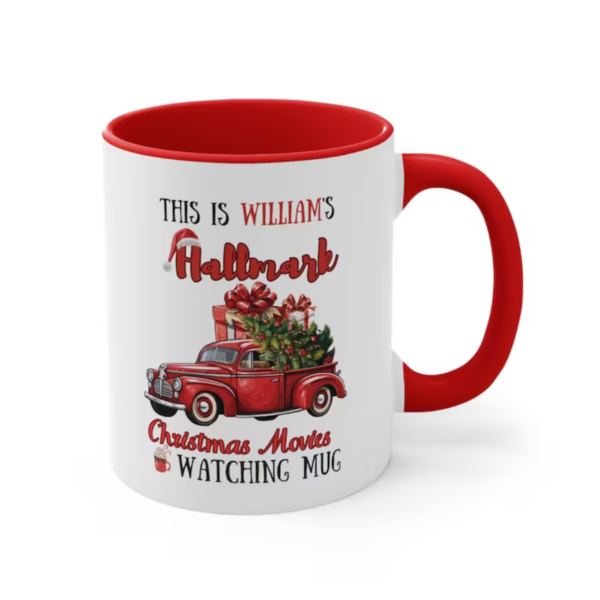 A personalized 11 oz sublimation mug featuring festive holiday designs with text that reads, "This is my Hallmark Christmas Movie Watching Mug." The mug is white with a glossy finish, perfect for sipping hot beverages during holiday movie nights, and can be customized with a name for a personal touch.