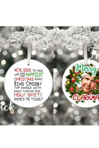 A round ceramic Christmas ornament featuring the humorous text, "And when Santa squeezes his fat ass down that chimney tonight," in bold festive fonts. The design includes playful holiday graphics like a Santa hat, chimney, or Christmas decorations, adding a fun and cheeky vibe to your holiday décor.