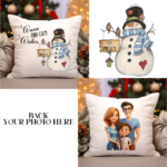 A 14x14 inch square throw pillow featuring a cheerful snowman and the phrase "Warmest Wishes." The pillow is soft with a vibrant winter-themed design, perfect for adding a cozy, festive touch to holiday décor.