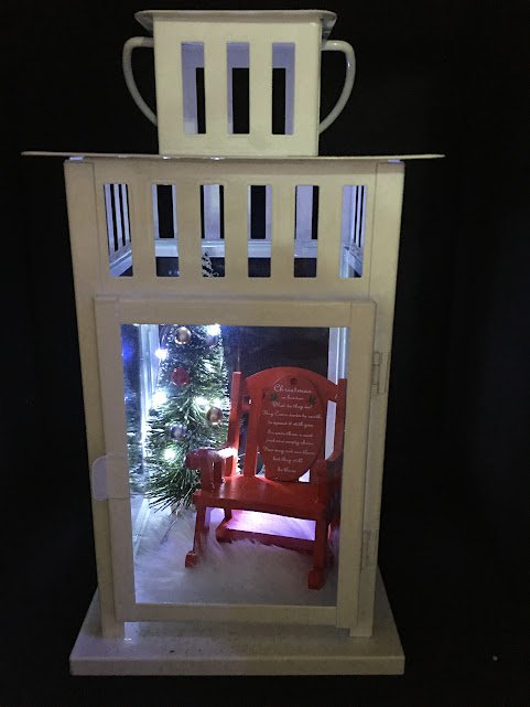 Elegant memorial lantern with soft LED lights, a customized photo, names and dates, creating a beautiful tribute to a loved one.