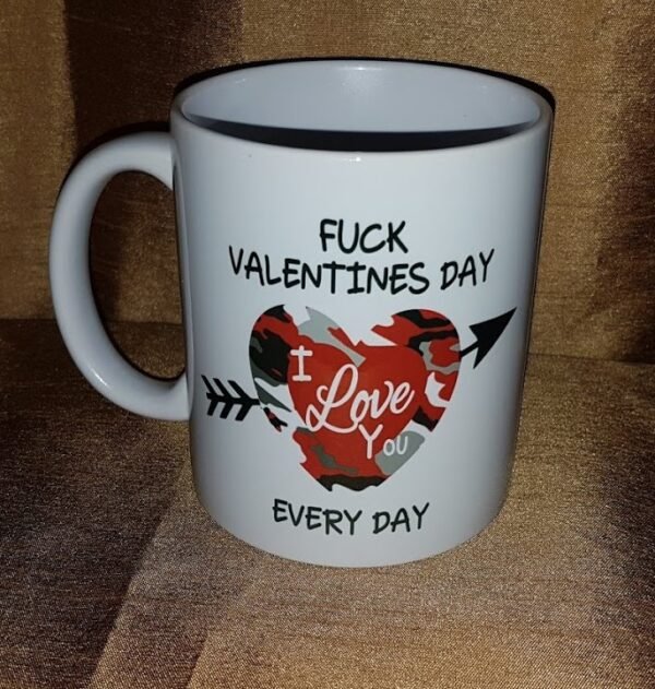 "White 15 oz. ceramic mug with the bold text 'F*ck Valentine's Day, I Love You Every Day' sublimated in vibrant colors, showcasing a quirky and heartfelt design. Perfect for daily use, dishwasher and microwave safe."