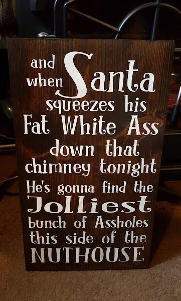 Humorous Christmas Sign Hand Painted on Solid Pine - When Santa Squeezes his Ass Down the Chimney Tonight the saying When Santa Squeezes his Fat White Ass down the Chimney Tonight.