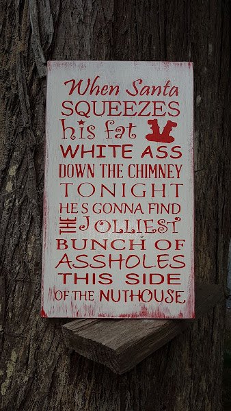 Humorous Christmas Sign Hand Painted on Solid Pine - When Santa Squeezes his Ass Down the Chimney Tonight the saying When Santa Squeezes his Fat White Ass down the Chimney Tonight.